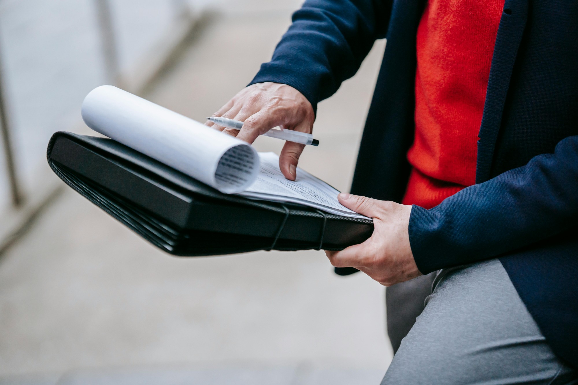 Consultant reviewing documents — forensic readiness assessment