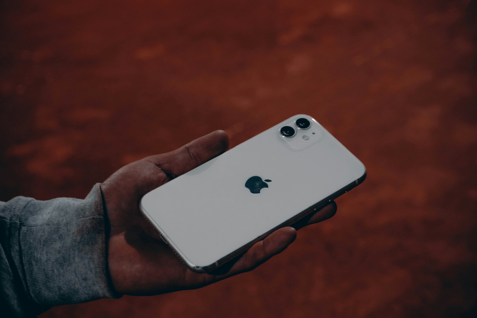 iPhone and MacBook on a desk - iCloud forensics