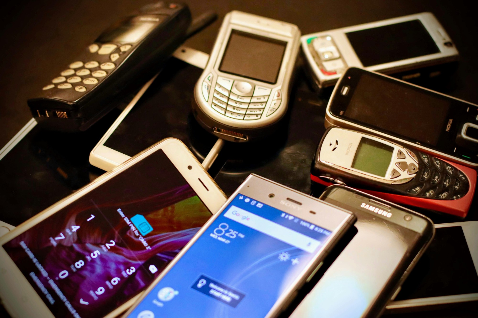Two phones with cables — mobile device forensics