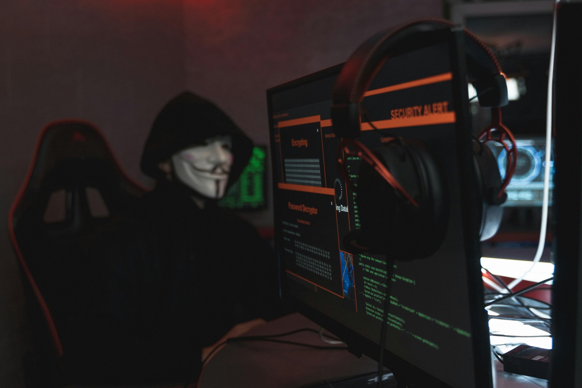 Threat-actor at workstation with decryption tooling — spyware and implant detection